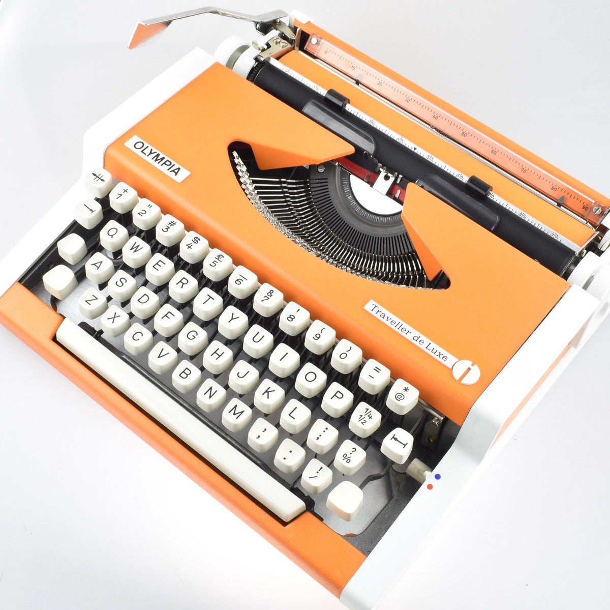 Olympia Traveller Deluxe Typewriter in limited Edition orange and